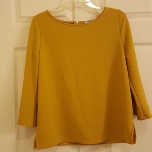 Women's gold shirt with zipper size medium